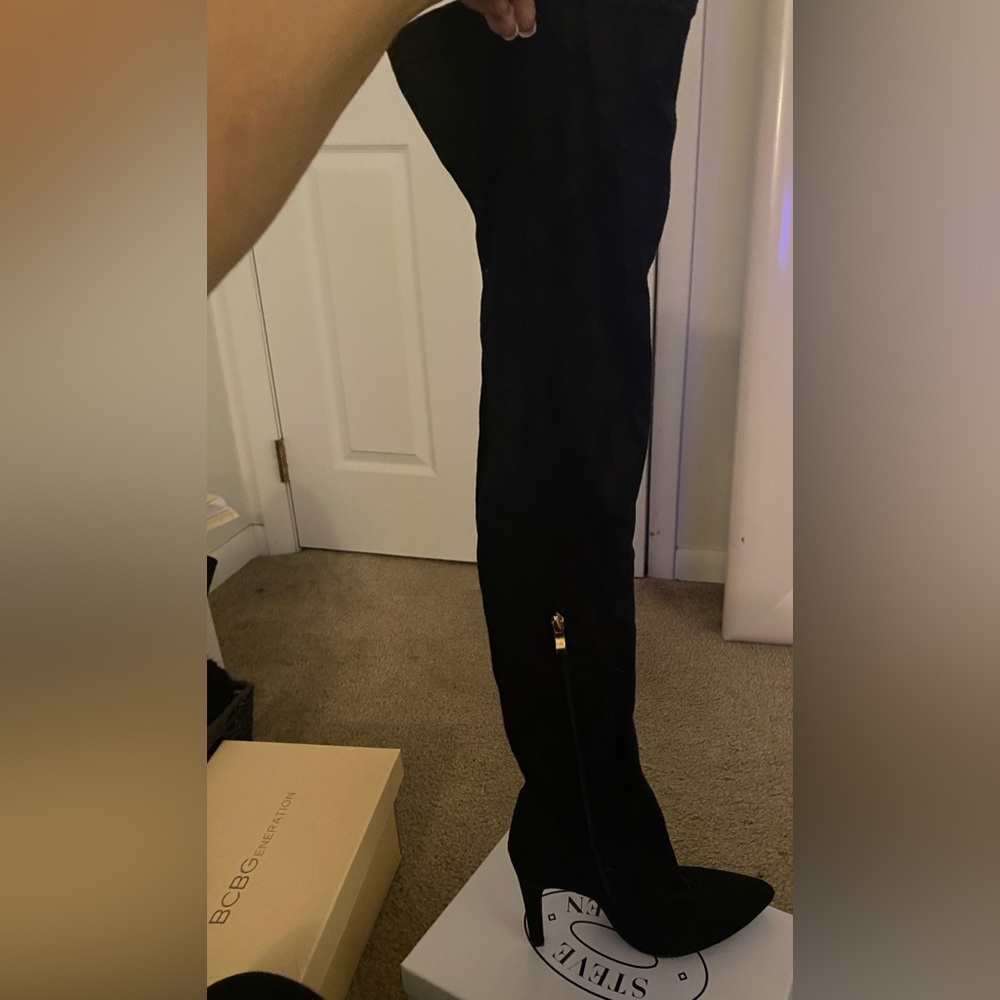 Women’s black over the knee boat
